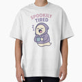 Spookily Tired Ghost – Cute Sleepy Spirit in Hoodie with Coffee Cup by AbderraimArt