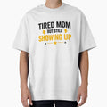 TIRED MOM BUT STILL SHOWING UP MOTIVATIONAL SHIRT by LunaSpellStudio
